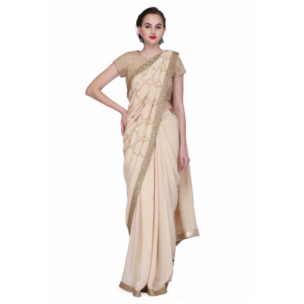 Designer zari gold blouse with eligent rime stone sari